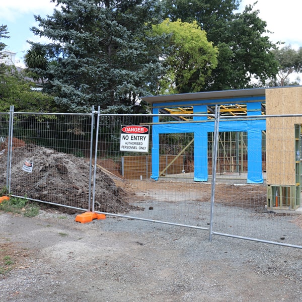 do you deliver and install temporary fencing and what's the price for these services in Essex Junction